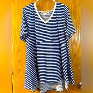 Super cute white umpire waist style top with royal blue stripes. LuLaRoe size L